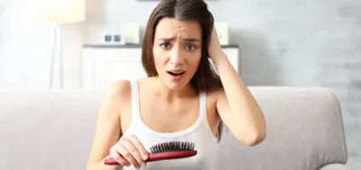Lysienie androgenowe u kobiet – przyczyny objawy